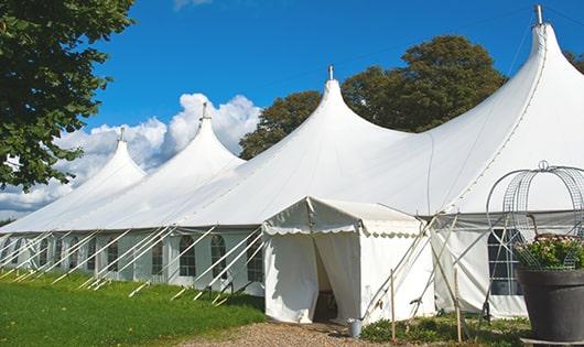 high-quality portable toilets stationed at a wedding, meeting the needs of guests throughout the outdoor reception in Fowler